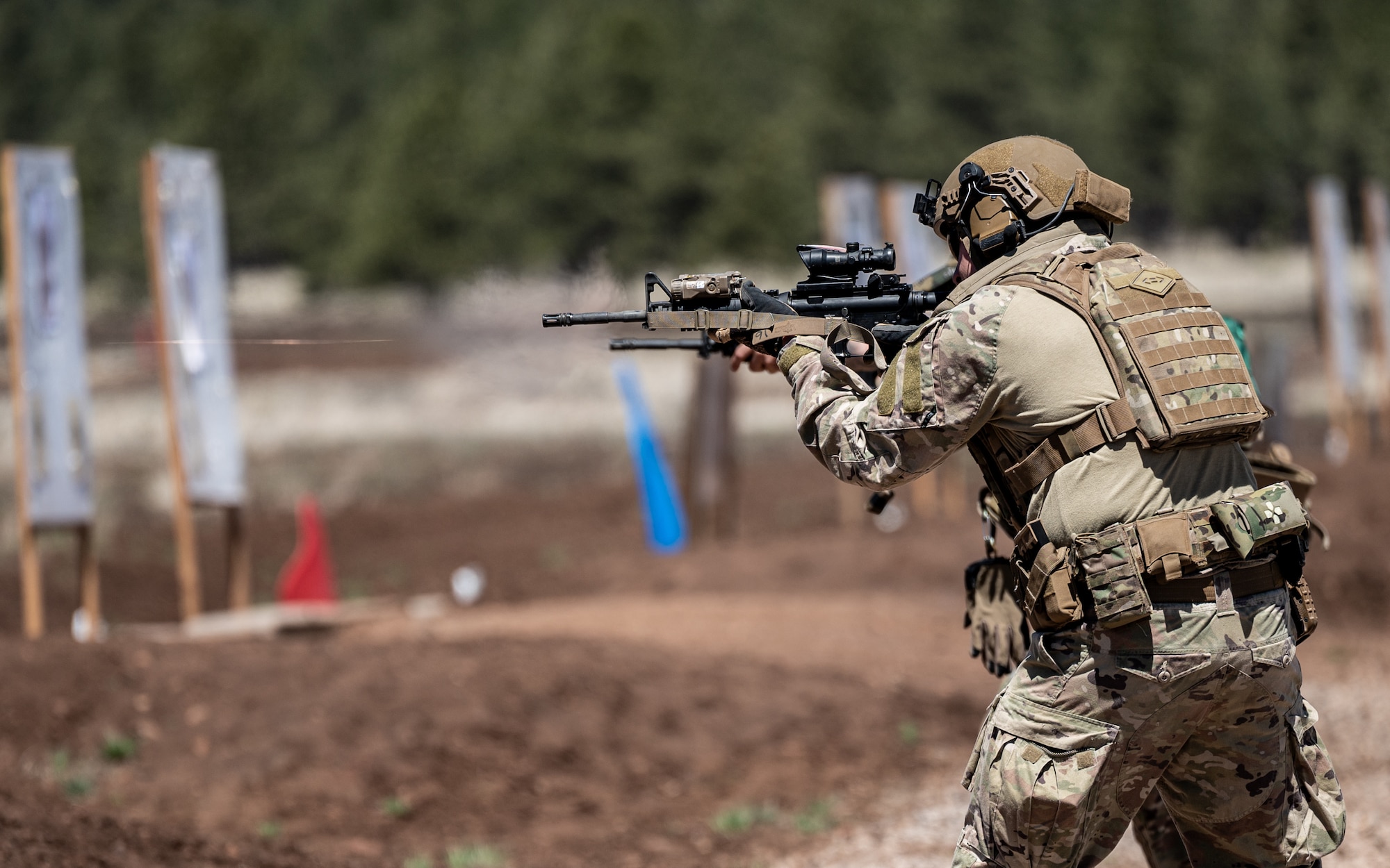 Senior Airman Randall Dorsett II, 56th Civil Engineer Squadron Explosive Ordnance Disposal technician fires an M4 carbine on a firing range during exercise Operation Pegasus at Camp Navajo, Arizona, April 21-26, 2024.