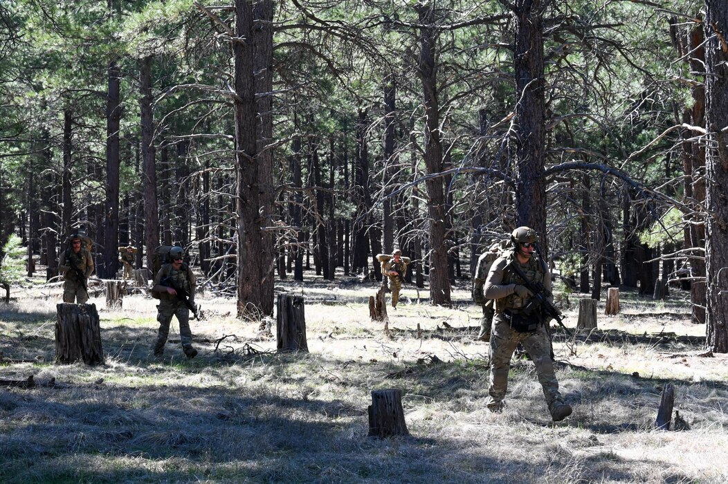 U.S. Air Force Airmen assigned to the 56th Civil Engineer Squadron Explosive Ordnance Disposal flight participate in a ruck march during exercise Operation Pegasus at Camp Navajo, Arizona, April 21-26, 2024.