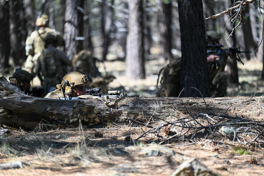 U.S. Air Force Senior Airman Randall Dorsett II, 56th Civil Engineer Squadron Explosive Ordnance Disposal technician, provides security watch over a rally point during exercise Operation Pegasus at Camp Navajo, Arizona, April 21-26, 2024.