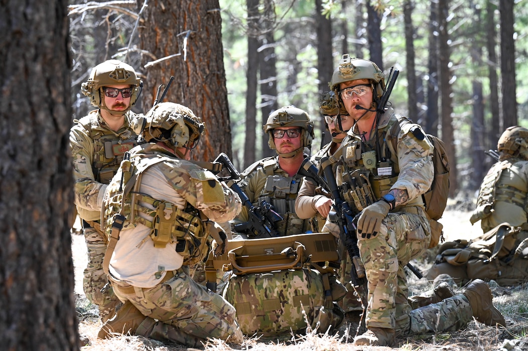 U.S. Air Force Airmen assigned to the 56th Civil Engineer Squadron Explosive Ordnance Disposal flight coordinate an assault plan during exercise Operation Pegasus at Camp Navajo, Arizona, April 21-26, 2024.