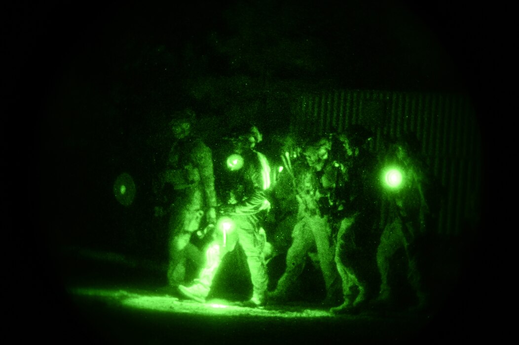 U.S. Air Force Airmen assigned to the 56th Civil Engineer Squadron Explosive Ordnance Disposal flight evacuate a simulated casualty after a night raid during exercise Operation Pegasus at Camp Navajo, Arizona, April 21-26, 2024.