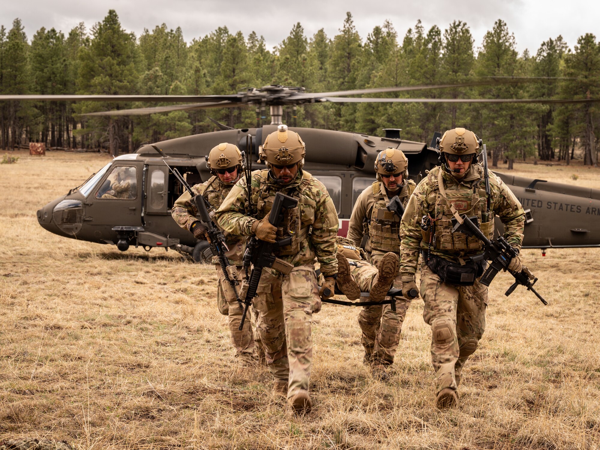 U.S. Air Force Airmen assigned to the 56th Civil Engineer Squadron Explosive Ordnance Disposal flight participate in an emergency evacuation scenario during Operation Pegasus at Camp Navajo, Arizona, April 21-26, 2024.