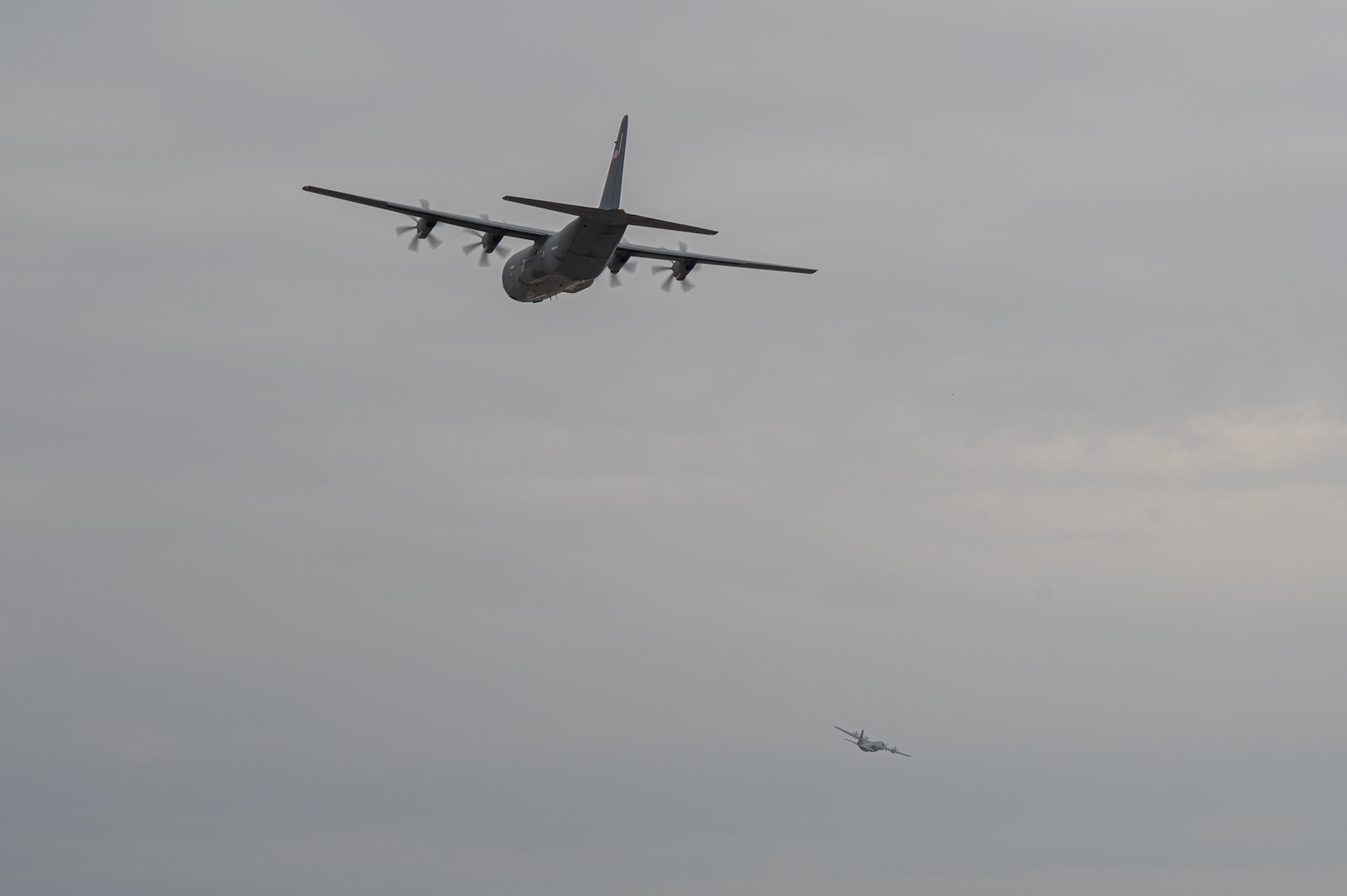 Two U.S. Air Force C-130J Super Hercules’ loaded with pallets of food destined for Gaza via airdrop take off from an undisclosed location within the U.S. Central Command area of responsibility, April 30, 2024. The U.S. Air Force’s rapid global mobility capability enabled the expedited movement of critical, life-saving humanitarian aid to Gaza. (U.S. Air Force photo)