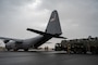 Bundles of humanitarian aid destined for Gaza are loaded onto a U.S. Air Force C-130J Super Hercules at an undisclosed location within the U.S. Central Command area of responsibility, April 30, 2024. The U.S. Air Force’s rapid global mobility capability is enabling the expedited movement of critical, life-saving supplies to Gaza. (U.S. Air Force photo)