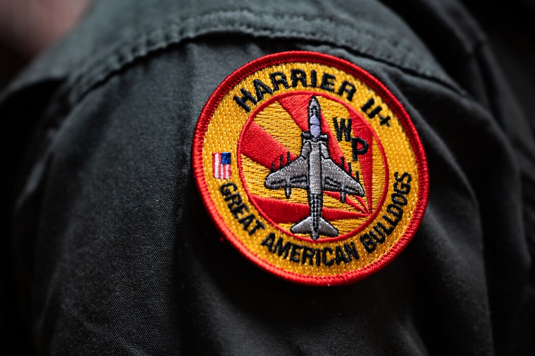 A custom patch sits on a service members uniform.