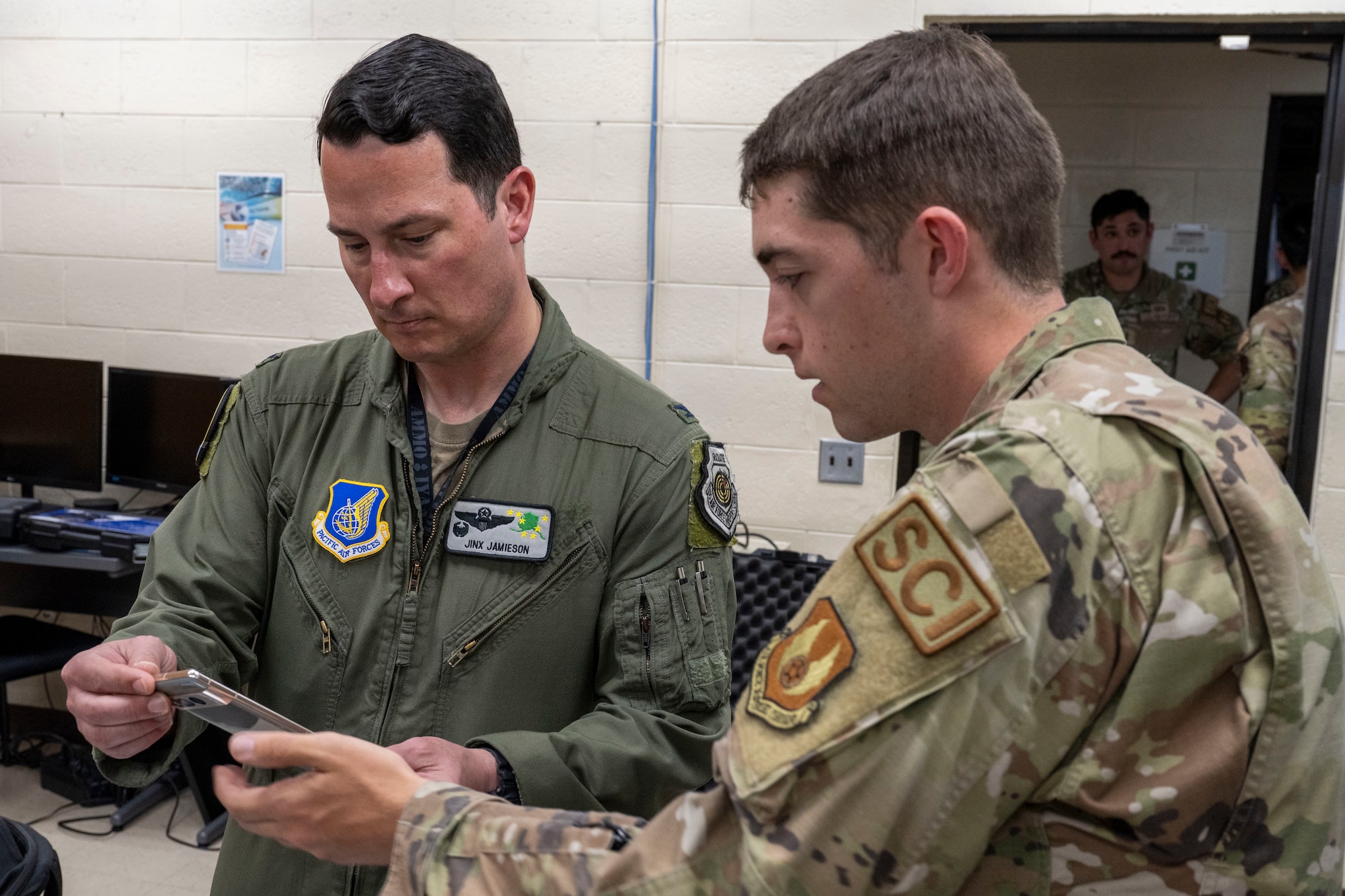 A photo of Airmen speaking during Agile Reaper.