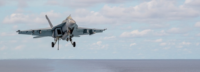 240429-N-EQ851-1125 SOUTH CHINA SEA (April 29, 2024) An F/A-18E Super Hornet, attached to the “Flying Checkmates” of Strike Fighter Squadron (VFA) 211, approaches to land on the flight deck of the Nimitz-class aircraft carrier USS Theodore Roosevelt (CVN 71), April 29, 2024. Theodore Roosevelt, flagship of Carrier Strike Group Nine, is underway conducting routine operations in the U.S. 7th Fleet area of operations. U.S. 7th Fleet is the U.S. Navy’s largest forward-deployed numbered fleet, and routinely interacts and operates with allies and partners in preserving a free and open Indo-Pacific region. (U.S. Navy photo by Mass Communication Specialist 3rd Class Adina Phebus)