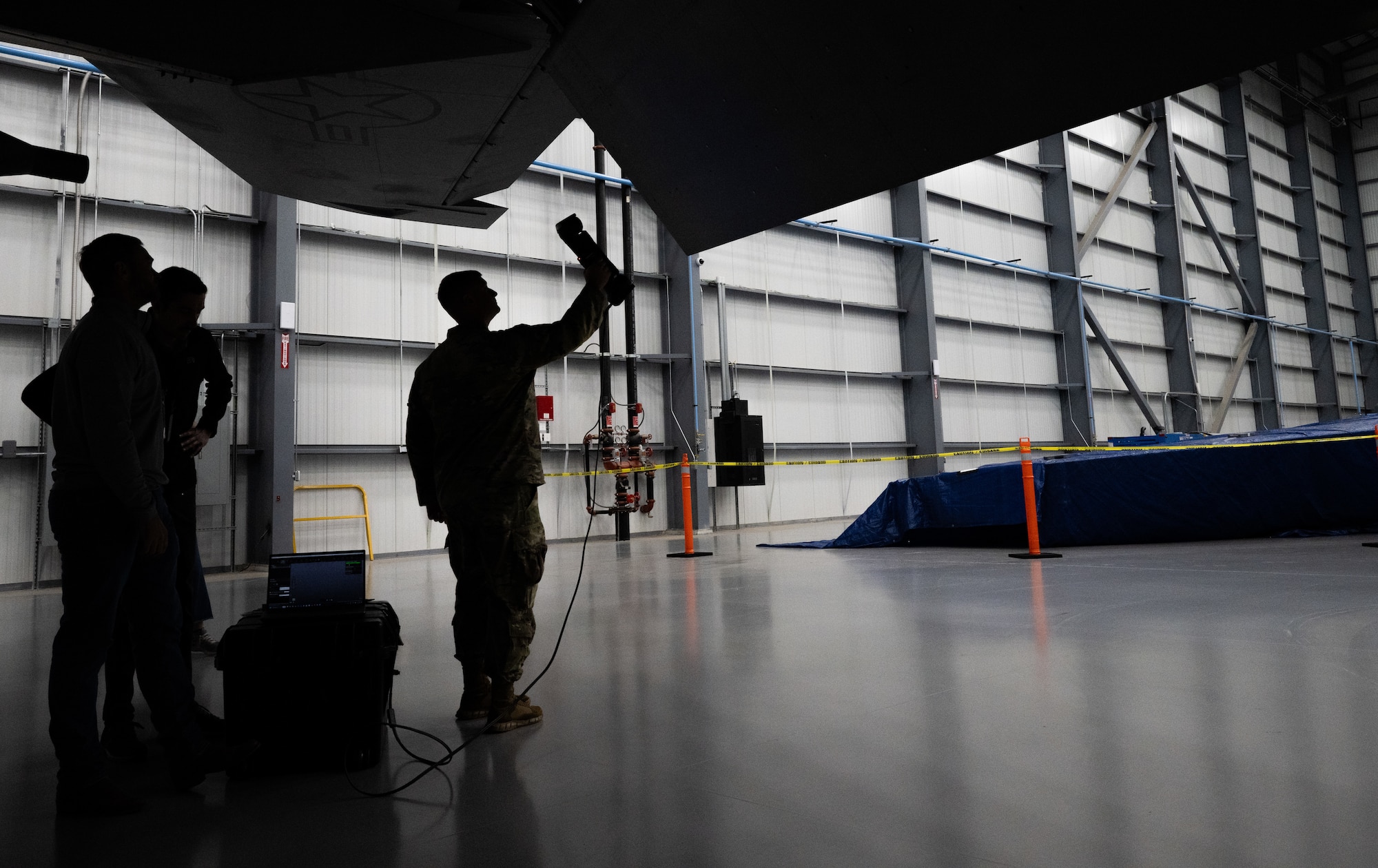 Master Sgt. James Goerss, 76th Aircraft Maintenance Group aircraft structural section chief, scans a wing flap on a KC-135 Stratotanker during STRATO-Tech, a convention for the sustainment of the KC-135 Stratotanker, April 22, 2024, in Wichita, Kansas. STRATO-Tech aims to bring the U.S. Air Force together with outside agencies to collaborate on innovative technology for the KC-135. (U.S. Air Force photo by Staff Sgt. Tryphena Mayhugh)