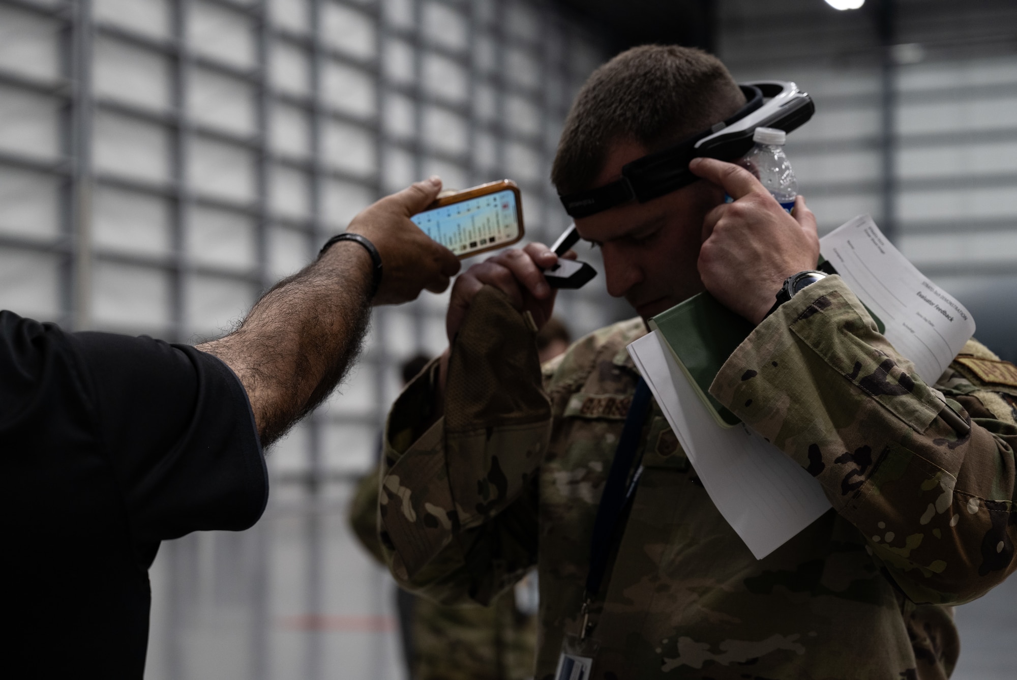 Master Sgt. James Goerss, 76th Aircraft Maintenance Group aircraft structural section chief, tests the voice-activation for a headset during STRATO-Tech, a convention for the sustainment of the KC-135 Stratotanker, April 23, 2024, in Wichita, Kansas. STRATO-Tech is an initiative under the Sustainment Technologies, Research and Automation for Transformative Operations Testbed that studies, develops and tests innovations to improve the efficiency and cost-effectiveness of the KC-135. (U.S. Air Force photo by Staff Sgt. Tryphena Mayhugh)