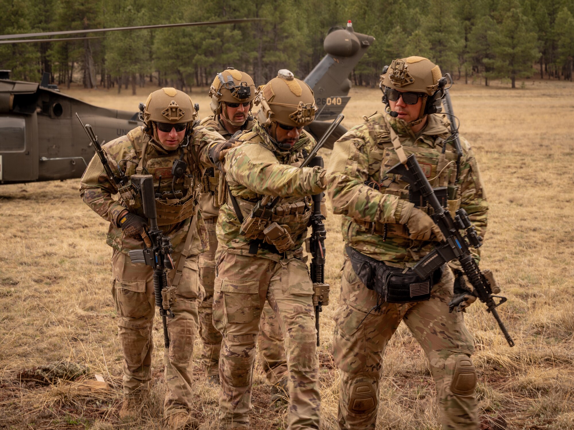 U.S. Air Force Airmen assigned to the 56th Civil Engineer Squadron Explosive Ordnance Disposal flight participate in an emergency evacuation scenario during Operation Pegasus at Camp Navajo, Arizona, April 21-26, 2024.