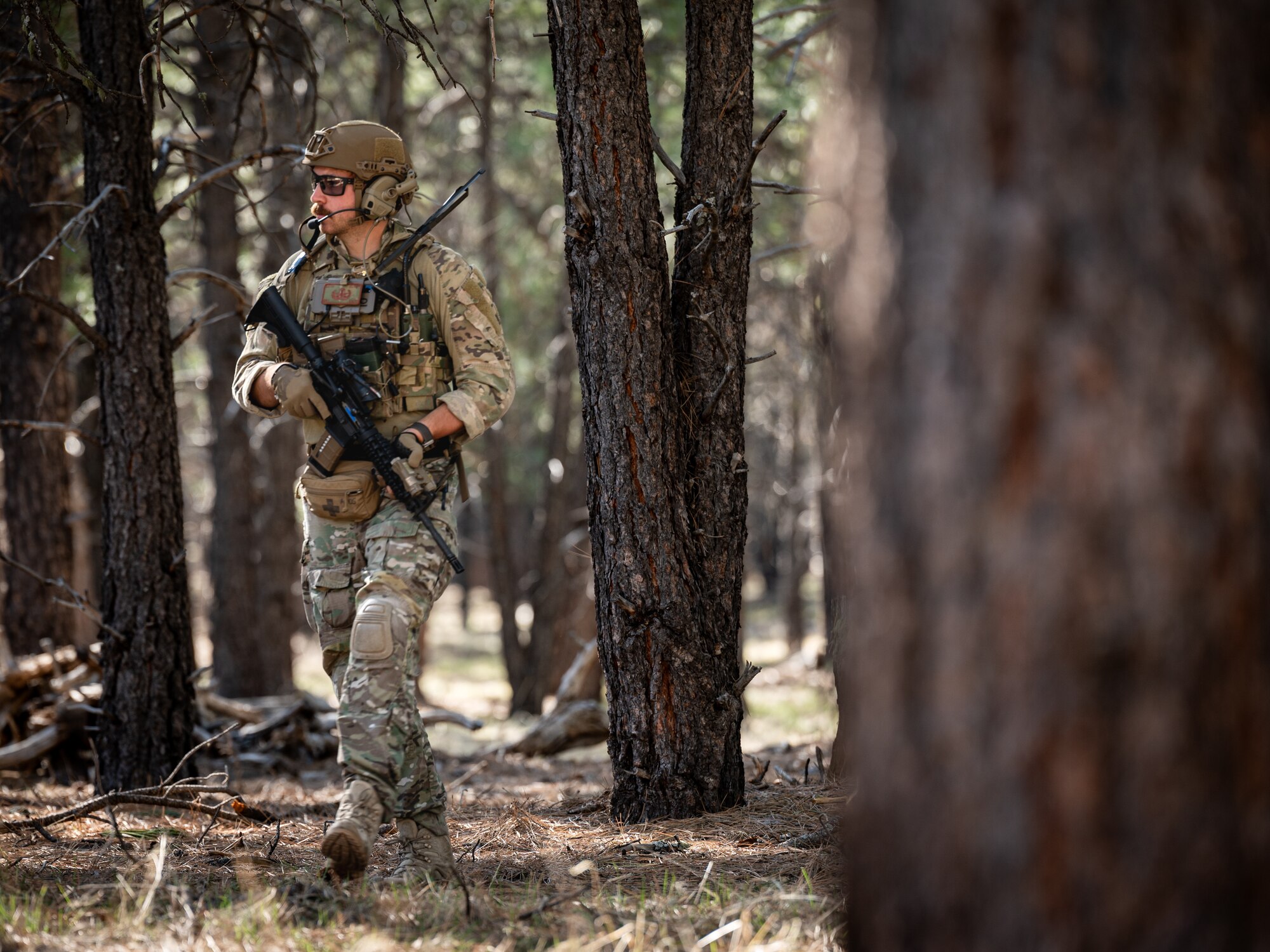 U.S. Air Force Senior Airman Seth Elroy, 56th Civil Engineer Squadron Explosive Ordnance Disposal technician, participates in an infiltration scenario during exercise Operation Pegasus at Camp Navajo, Arizona, April 21-26, 2024.