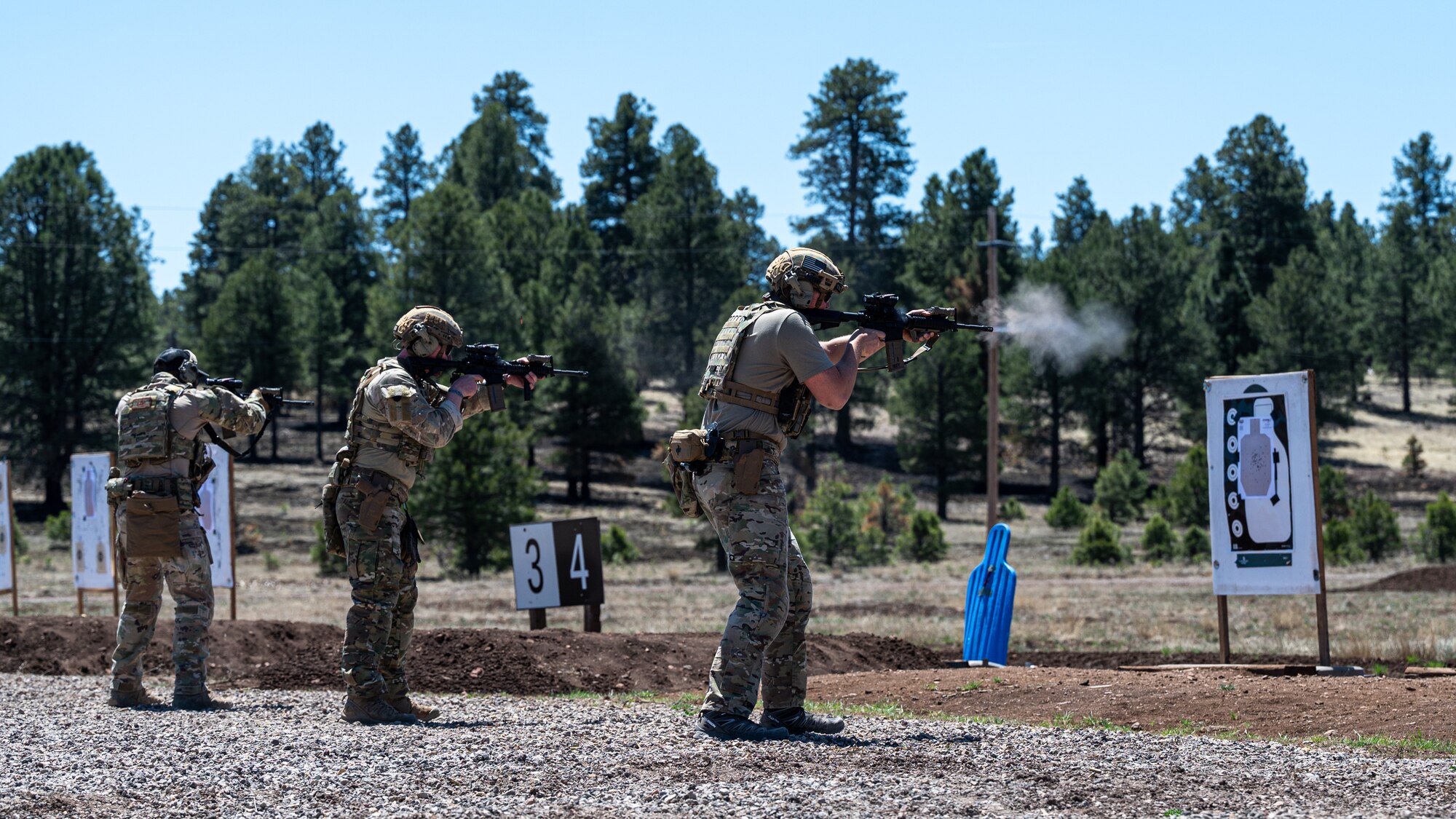 U.S. Air Force Airmen assigned to the 56th Civil Engineer Squadron Explosive Ordnance Disposal flight fire M4 carbines on a firing range during exercise Operation Pegasus at Camp Navajo, Arizona, April 21-26, 2024.