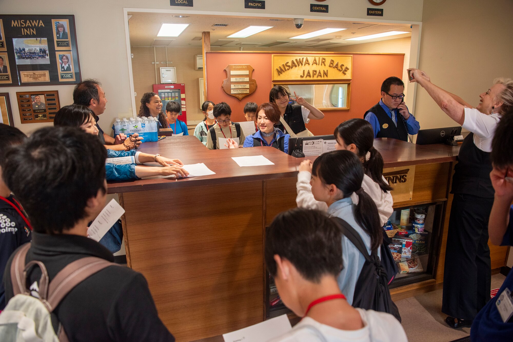 Towada Middle School students learn about the Misawa Inn receptionist’s responsibilities during a Junior English tour at Misawa Air Base, Japan, July 24, 2024.
