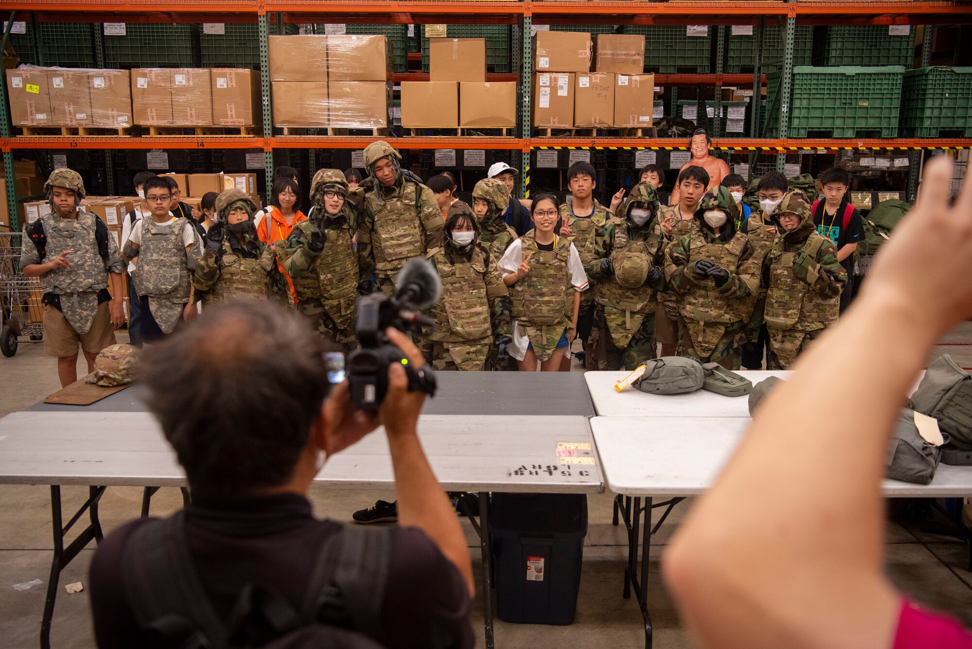 Misawa City Middle School students pose for a photo during a Junior English tour at Misawa Air Base, Japan, July 25, 2024.