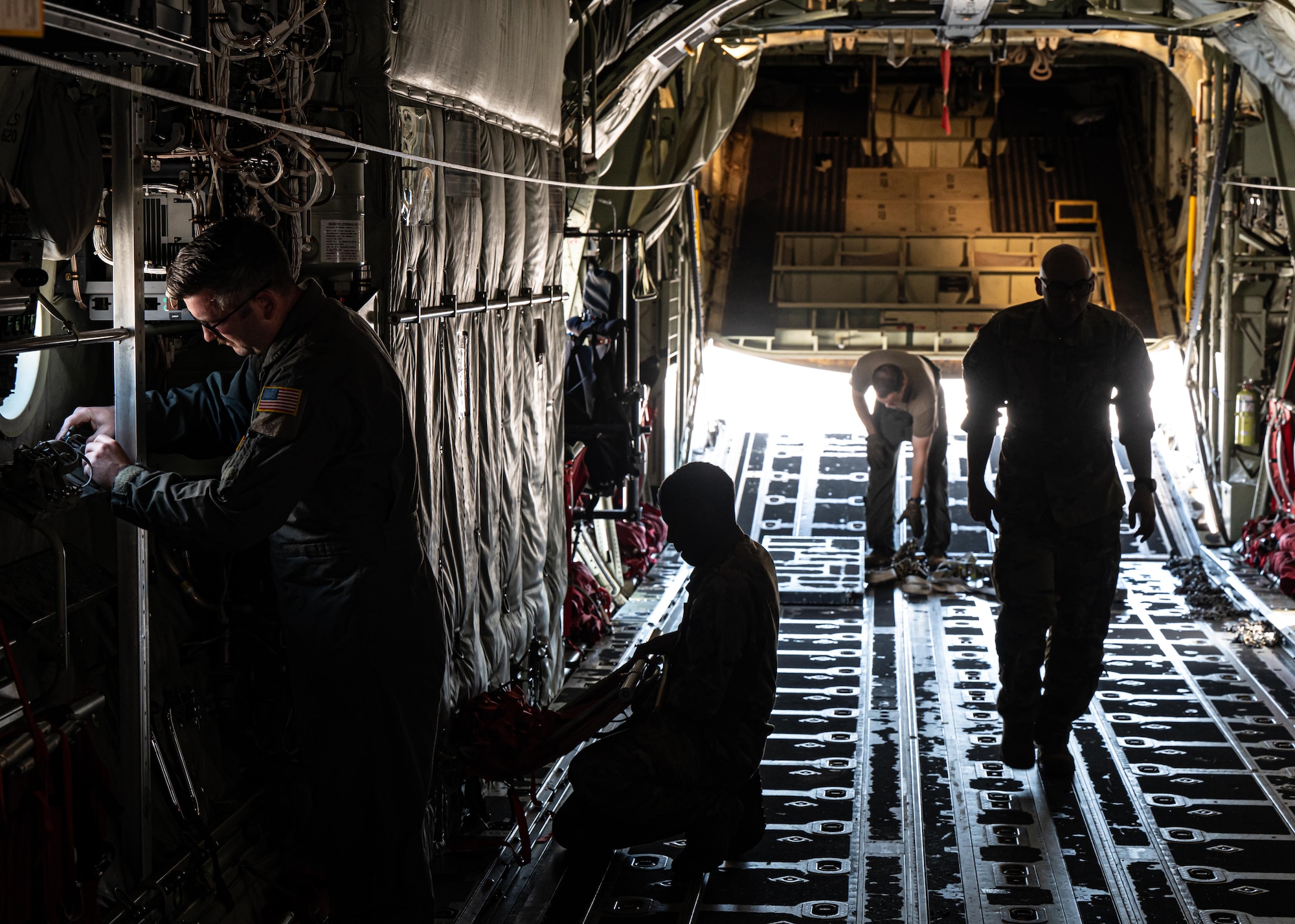 U.S. Airmen with the 37th Airlift Squadron C-130J Super Hercules loadmasters and pilots prepare the cargo bay to transport a U.S. Army National Guard M142 High Mobility Artillery Rocket System (HIMARS) at Ramstein Air Base, Germany, July 29, 2024.
