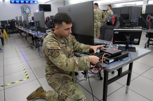 Airman kneeling
