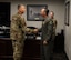 U.S. Air Force Col. Darren Duncan, U.S. Strategic Command command chaplain (left), is greeted by U.S. Air Force Col. Jesse Lamarand, 5th Bomb Wing commander, at Minot Air Force Base, North Dakota, July 30, 2024. The two leaders discussed ongoing initiatives to support the spiritual resilience of Airmen stationed at Minot AFB, highlighting the importance of comprehensive wellness programs for mission readiness and overall well-being. (U.S. Air Force photo by Airman 1st Class Luis Gomez)