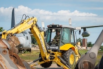 U.S. Air Force Tech. Sgt. Jacob W. Klika, assigned to the 128th Air Refueling Wing, Milwaukee, WI, practices excavator training at Volk Field Air National Guard base, Camp Douglas, Wisconsin, July 16, 2024.