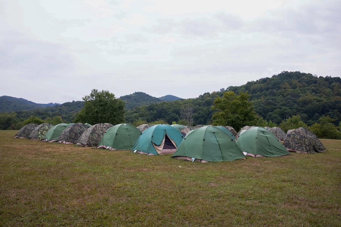 U.S. Marine Corps combat tents used by Service Company, 6th Communication Battalion, Force Headquarters Group, Marine Forces Reserve, are set during Innovative Readiness Training at Stonewall State Park, West Virginia, July 24, 2024. IRT provides a training opportunity for Marines by engaging with the community, conducting civil projects and increasing military occupational specialty proficiency. (U.S. Marine Corps photo by Lance Cpl. Kanoa Thomas)