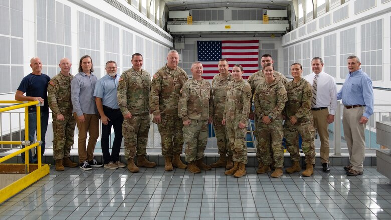 Members of the Tennessee National Guard visit the Cheatham Powerhouse with U.S. Army Corps of Engineers Nashville District officials in Ashland City, Tennessee, July 29, 2024. The adjutant general of the TNG, Maj. Gen. Warner Ross II, visited the facility to learn about USACE capabilities and explore current and future partnerships to help the Guard fulfill its missions in Tennessee, which include military readiness and emergency support to civil authorities. (USACE Photo by Jeremy Croft)
