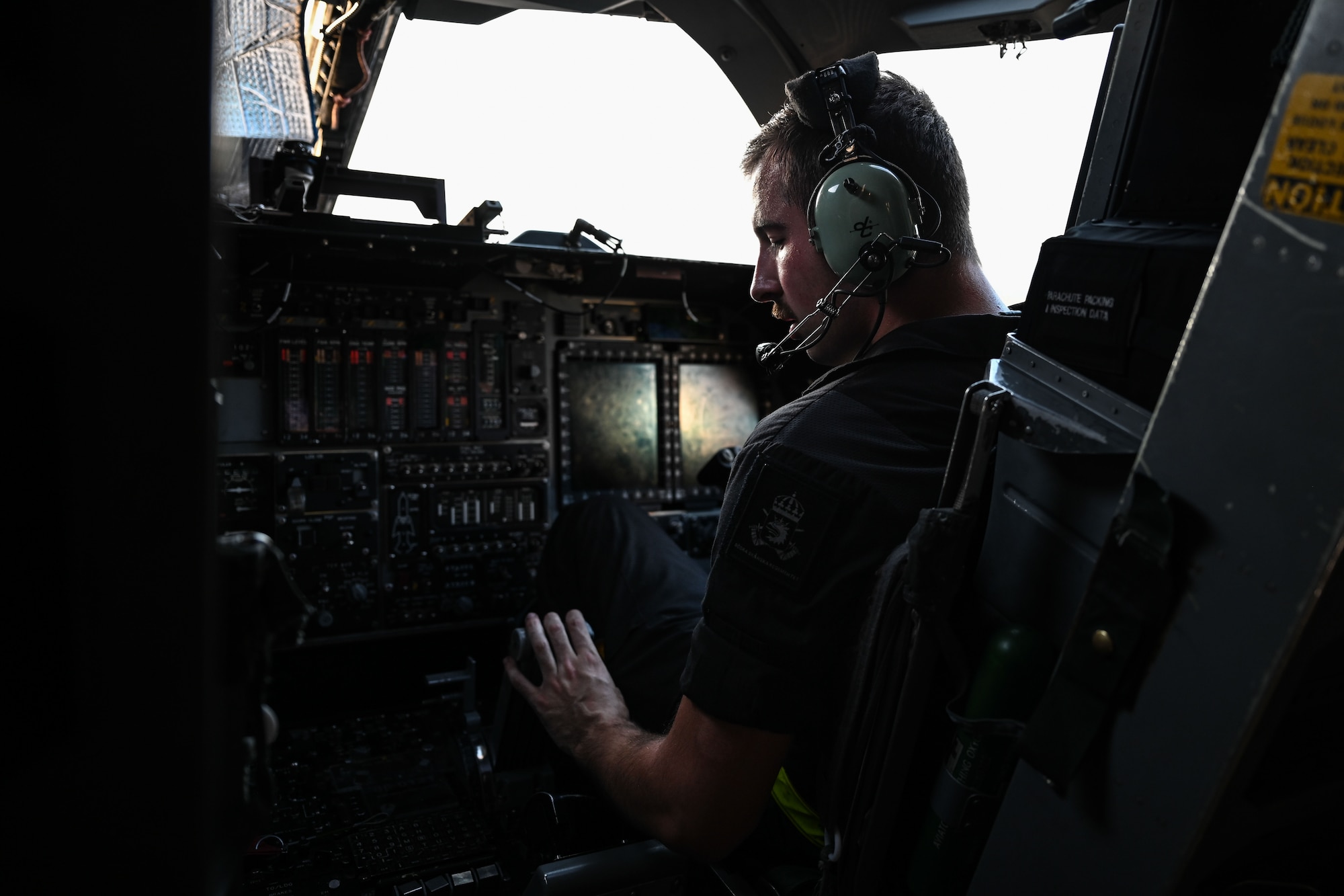 U.S. Air Force Staff Sgt. Jacob Szatkowski, 28th Maintenance Group dedicated crew chief, runs the auxiliary power unit of a B-1B Lancer to perform a refuel during Red Flag 24-3 at Nellis Air Force Base, Nev., July 25, 2024. Red Flag is an opportunity to enhance the readiness and training necessary to respond as a joint force to any potential crisis or challenge across the globe. (U.S. Air Force Photo by Senior Airman Yendi Borjas)