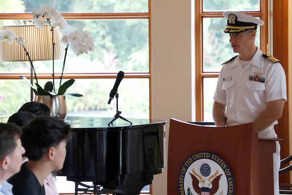 SINGAPORE (July 26, 2024) Capt. Andrew Letizia speaks at the Naval Medical Research Unit (NAMRU) INDO PACIFIC change of command ceremony in which Capt. Jonathan Stahl was relieved by Capt. Nicholas Martin as commanding officer. NAMRU INDO PACIFIC conducts research in cooperation with host nations in Australia, Korea, Laos, Malaysia, Mongolia, Papua New Guinea, Singapore, Thailand, and Vietnam to improve global health, ensure military force health protection and address infectious diseases such as malaria, dengue fever virus and gastro-intestinal pathogens. (U.S. Navy photo by Tommy Lamkin/Released)