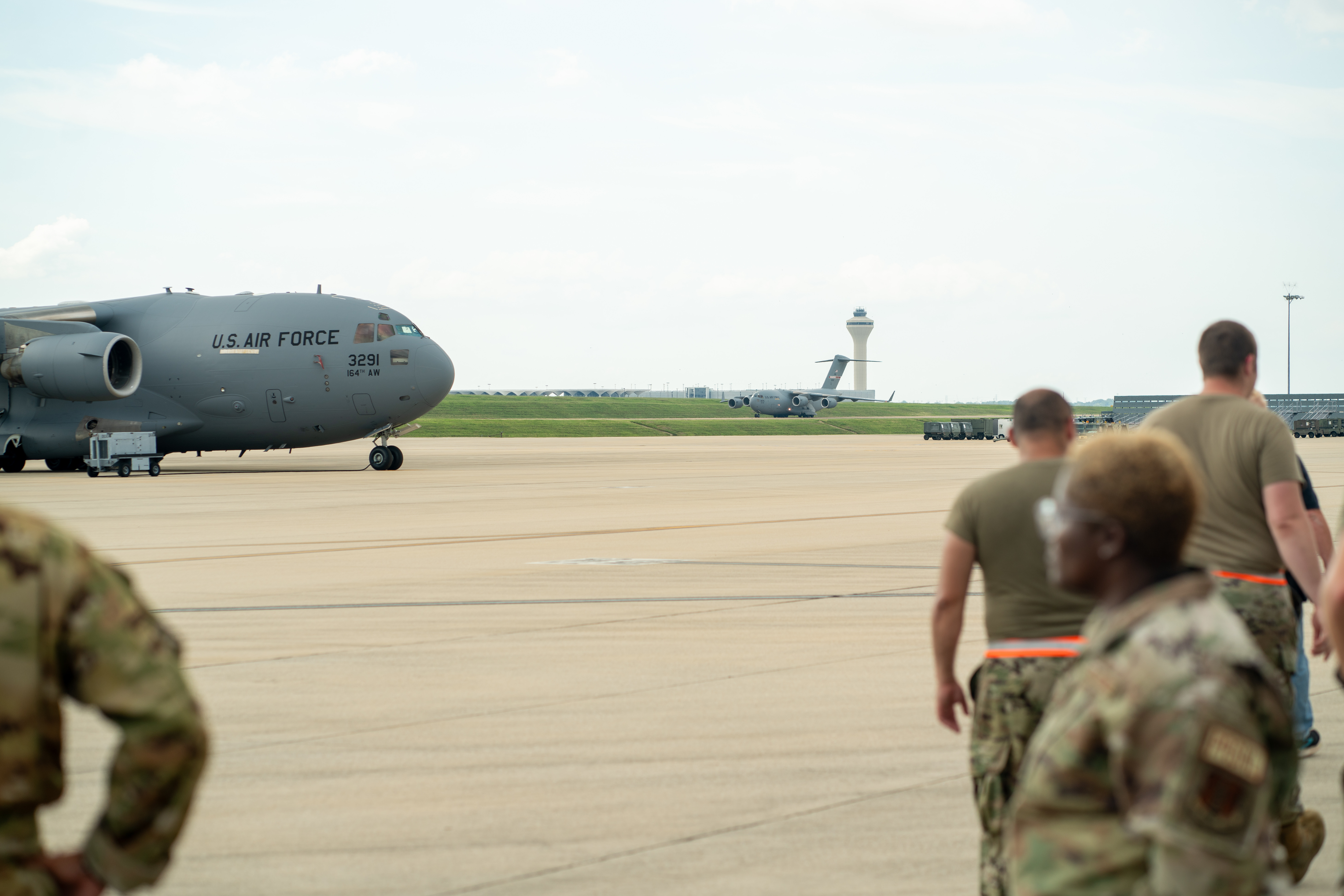 A plane full of Airmen  with the 164th Airlift Wing lands at the Memphis Air National Guard Base, June 28, 2024. These are Airmen from the  Operations and Maintenance groups that have been deployed for three months.