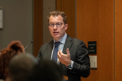DCSA Director David M. Cattler speaks at the Inaugrual NIPS Signatory Conference with Assistant Director for Industrial Security Mr. Matt Redding in McLean, Va., Aug. 1, 2024 (DOD Photo by Christopher P. Gillis).