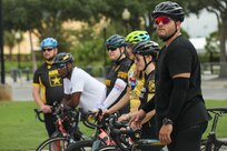 U.S. Army Spc. Janmiguel Torres-Cruz and other Team Army athletes prepare for cycling familiarization during the 2024 Department of Defense Warrior Games