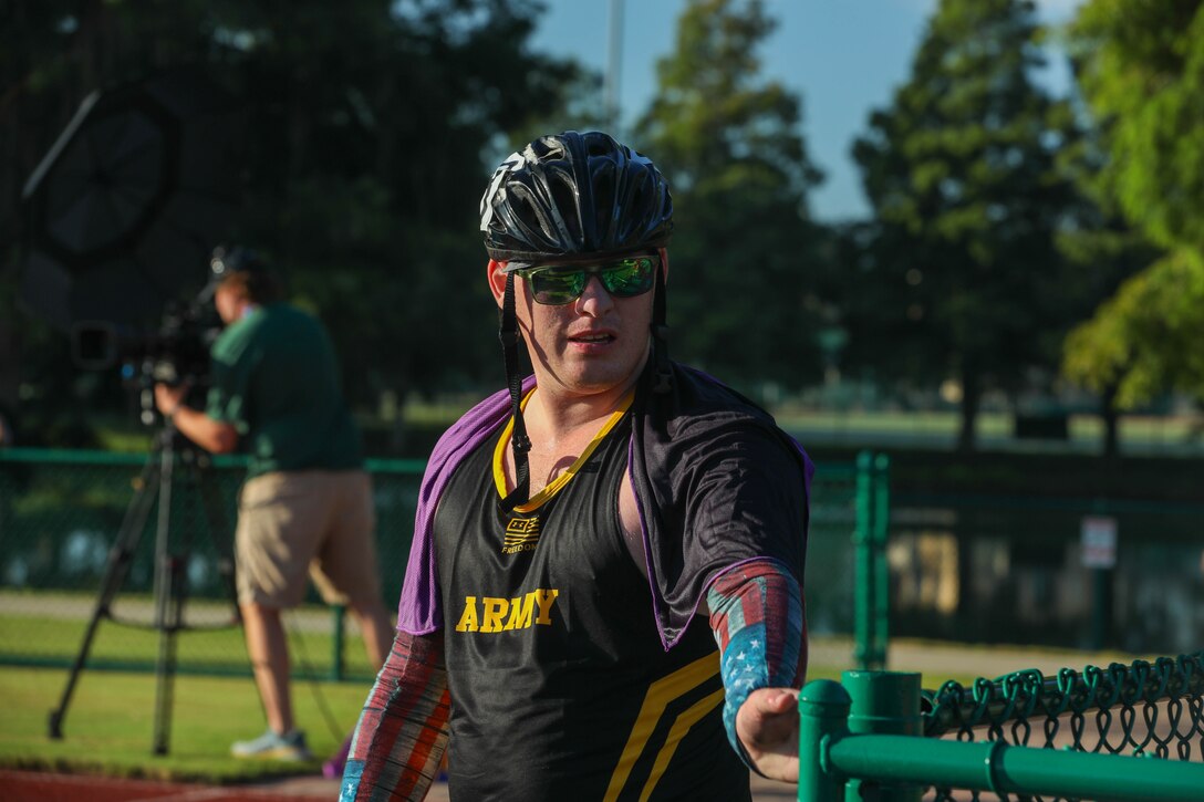 U.S. Army veteran Gerald Blakley takes a moment after his race at the track event during the 2024 Department of Defense Warrior Games