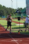 U.S. Army Sgt. 1st Class Jeffrey Peters competes in the track event during the 2024 Department of Defense Warrior Games