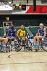U.S. Army Gene Calantoc yells for a teammate in a wheelchair basketball game during the 2024 Department of Defense Warrior Games