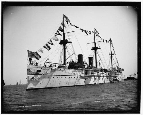 A protected cruiser afloat at sea.