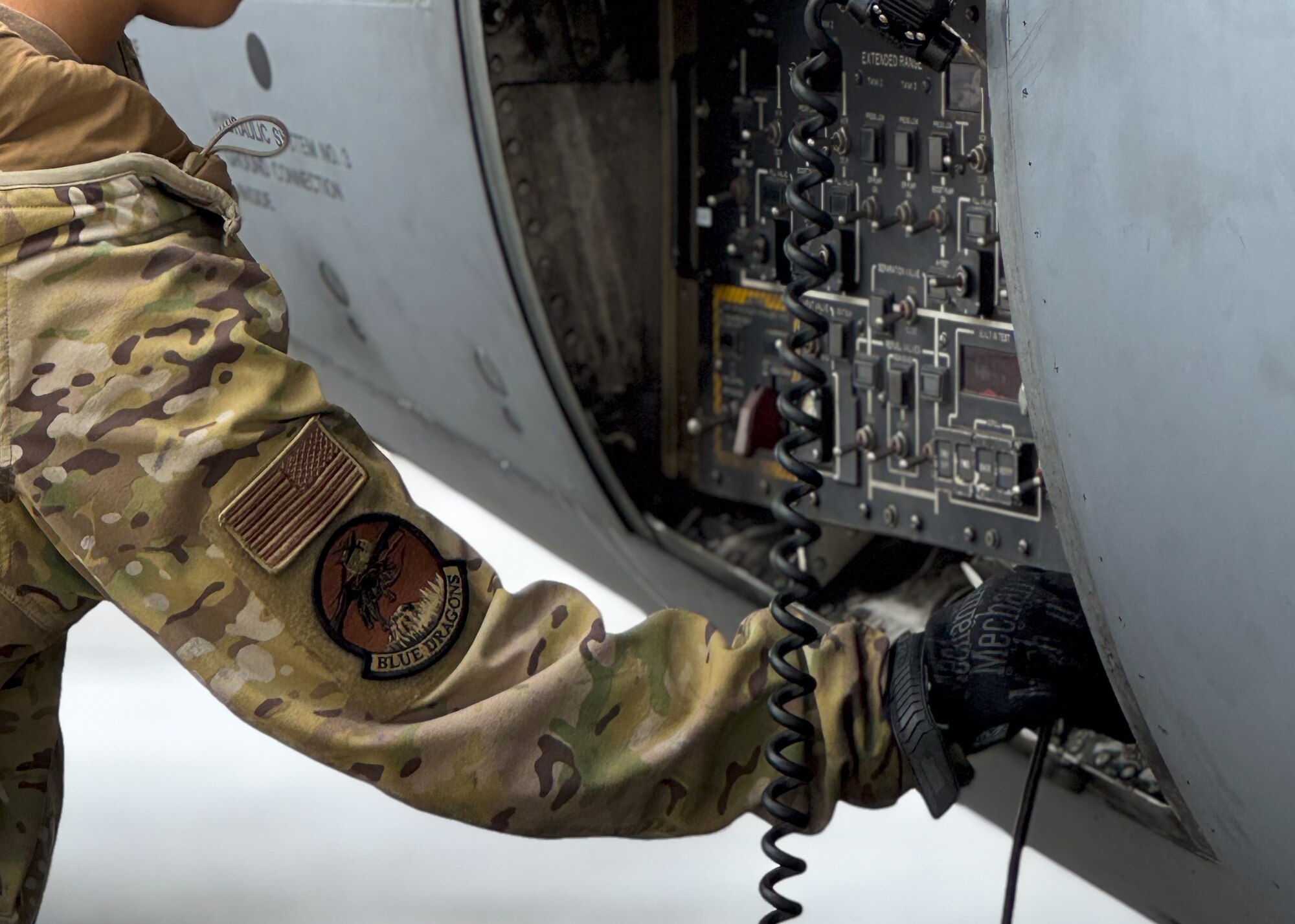 U.S. Air Force Airmen perform pre-flight checks at Joint Base Lewis-McChord, Washington, July 29, 2024. Crew chiefs from the 62d Aircraft Maintenance Squadron are responsible for many tasks including aircraft maintenance, inspections, repairs, and marshalling aircraft departing and arriving.