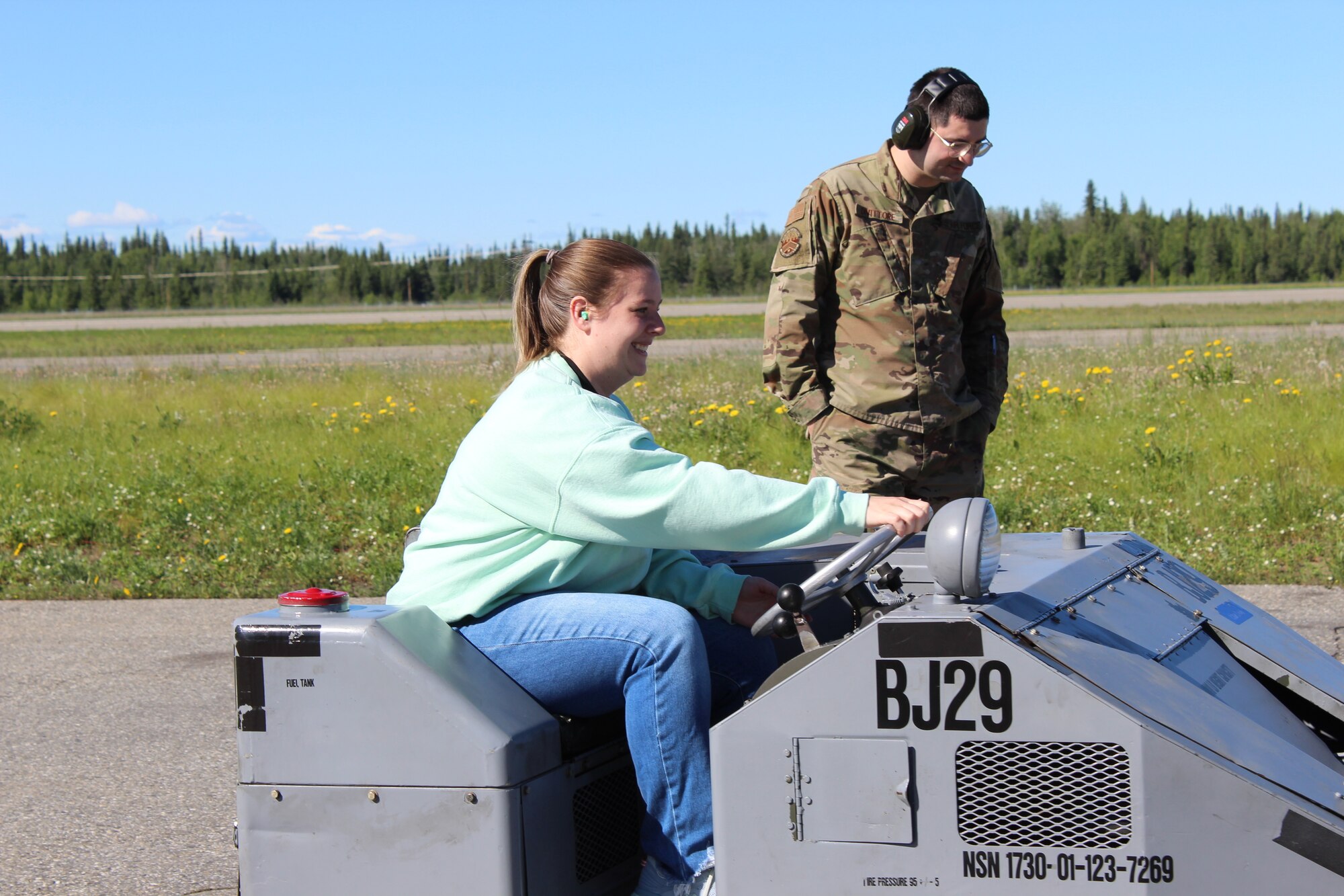 Spouses of the 354th Maintenance Squadron drive bomb lifts during a Mighty Moose Spouse’s Tour at Eielson Air Force Base, Alaska, June 7, 2024. The tour was designed to allow maintainer spouses to see a snapshot of what the 354th MXS team does on a day to day basis.