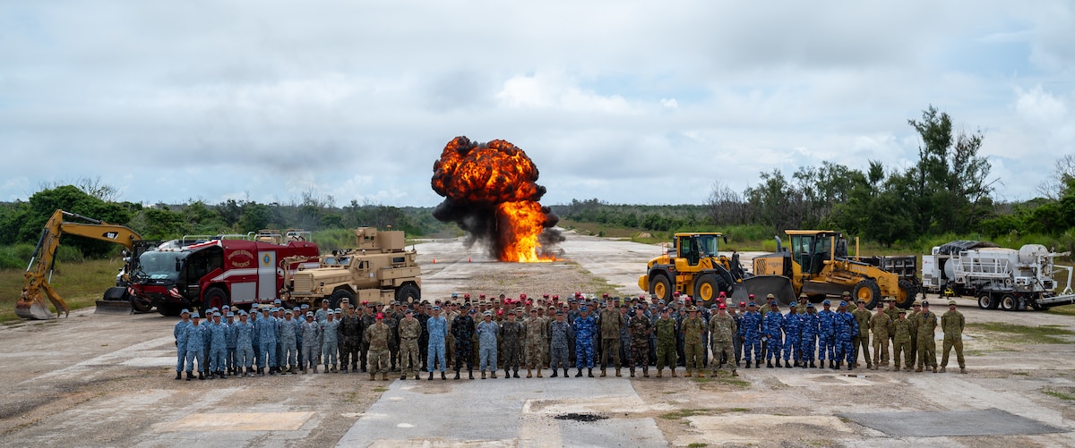 Indo-Pacific Unity Allies and Partners Engineer Summit participants gather for a group photo at the Pacific Regional Training Center-Andersen, Guam, July 26, 2024. The engagement provided a forum for allied and partnered engineers to exchange views, create professional relationships, enhance partner capacity, promote regional stability, and increase engineer interoperability throughout the theater. (U.S. Air Force photo by Airmen 1st Class Manasseh Demissie)