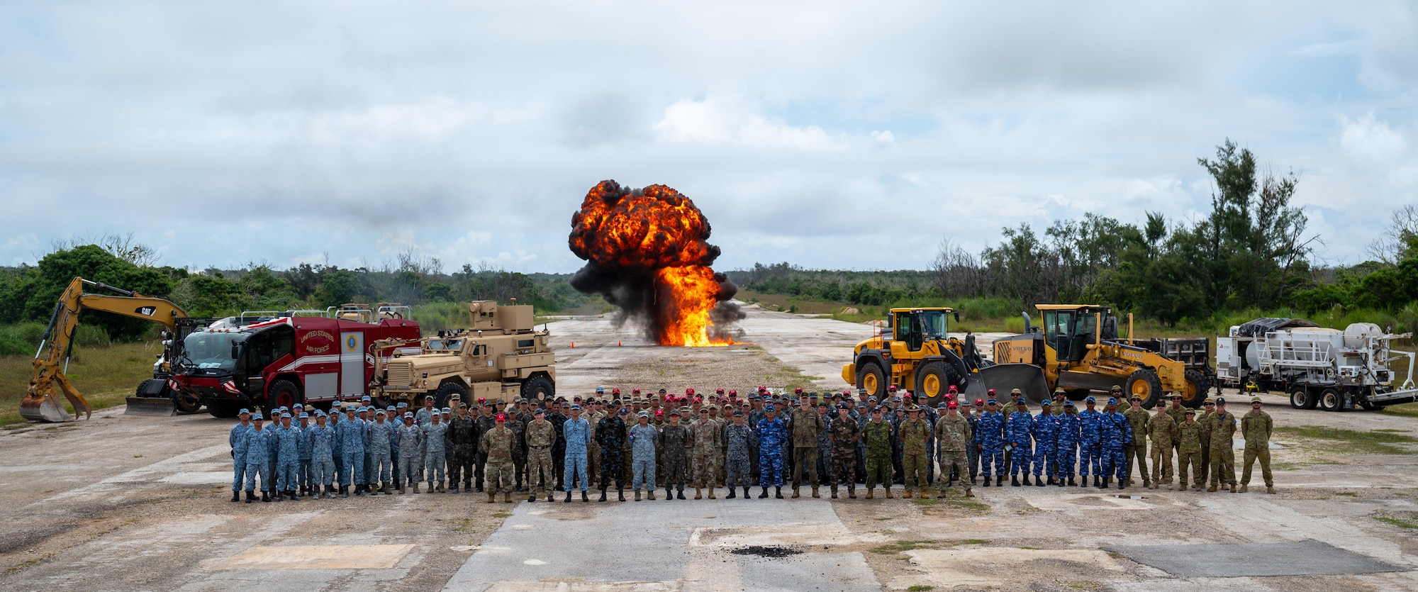 Indo-Pacific Unity Allies and Partners Engineer Summit participants gather for a group photo at the Pacific Regional Training Center-Andersen, Guam, July 26, 2024. The engagement provided a forum for allied and partnered engineers to exchange views, create professional relationships, enhance partner capacity, promote regional stability, and increase engineer interoperability throughout the theater. (U.S. Air Force photo by Airmen 1st Class Manasseh Demissie)