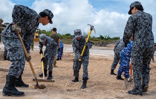 Japan Air Self-Defense Force members participate in a joint, multilateral rapid airfield damage repair training as a part of the Silver Flag exercise, at the Pacific Regional Training Center-Andersen, Guam, July 25, 2024.  The goal of the annual exercise is to enhance partnerships, promote regional stability and increase engineer interoperability. (U.S. Air Force Photo by Airman 1st Class Manasseh Demissie)