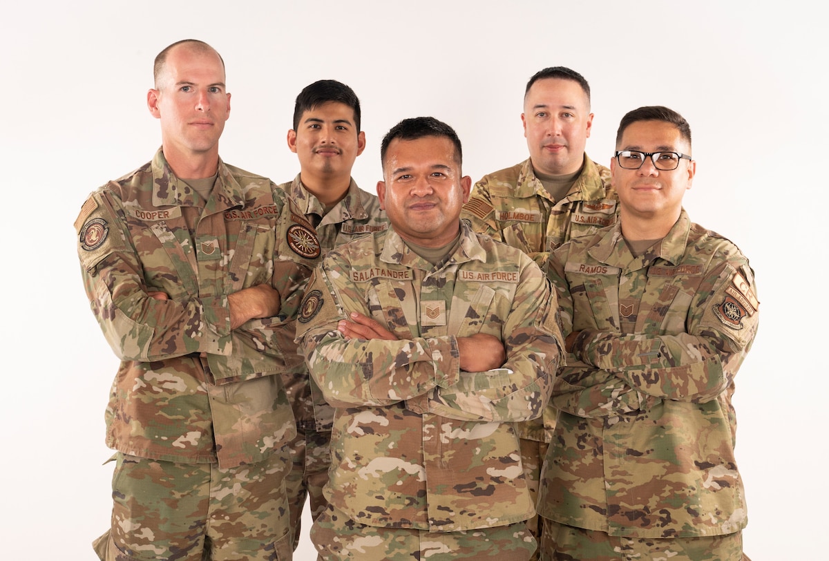 Tech. Sgt. Jun Salatandre, center, 921st Contingency 921st Contingency Response Squadron first rotary wing aircraft maintainer and Moffitt operational support team leader, poses for a photo with a few members from his OST at Travis Air Force Base, California, July 29, 2024.