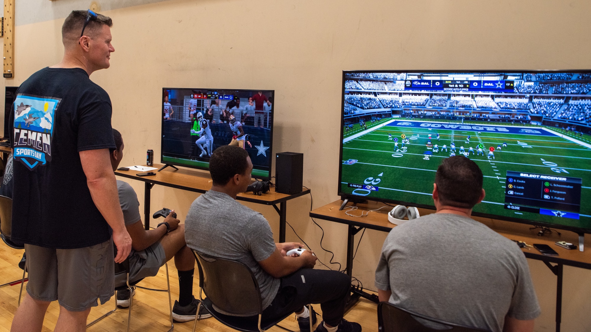 U.S. Air Force Col. Paul P. Townsend, 354th Fighter Wing commander, spectates an Air Force Gaming tournament