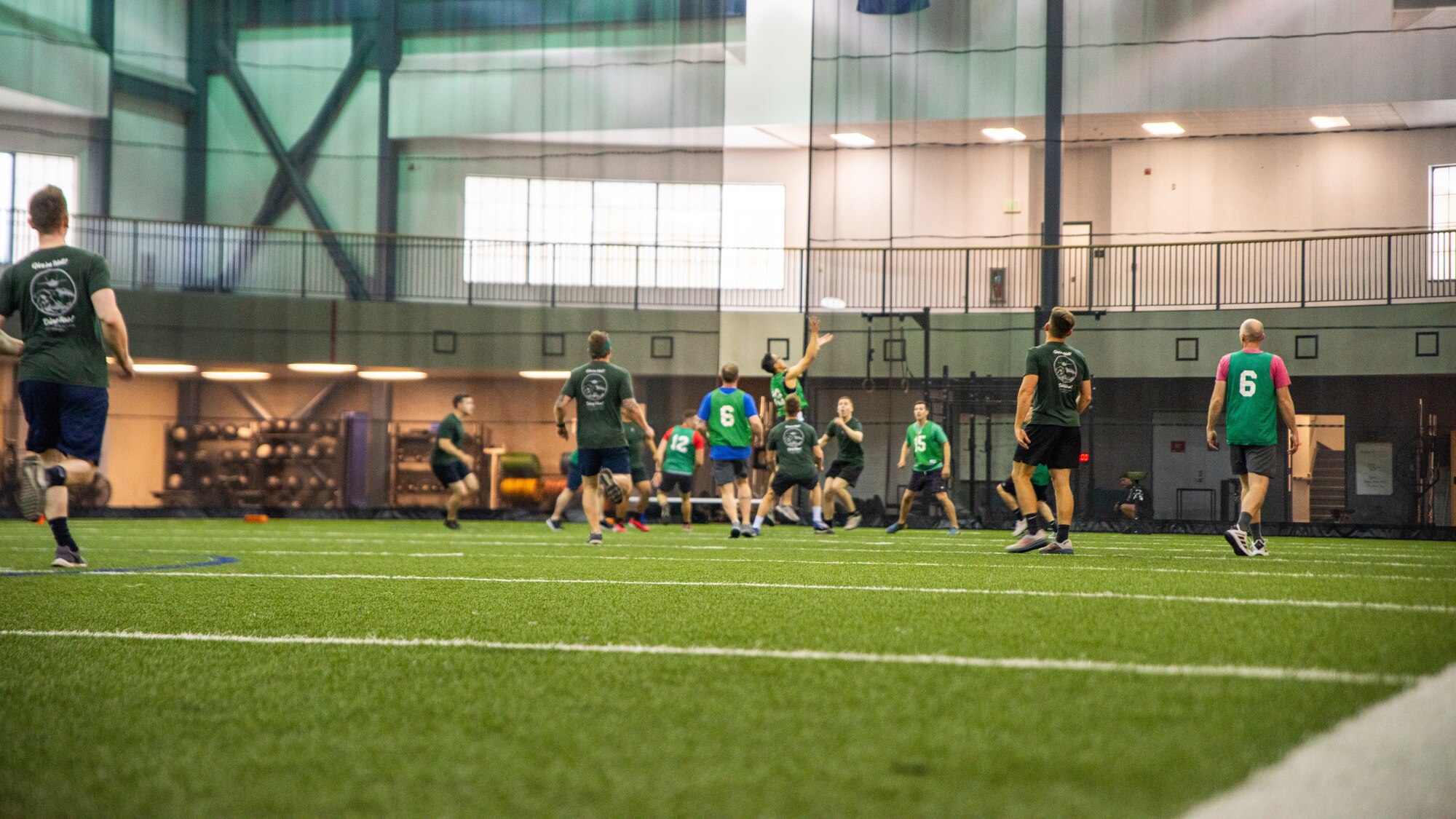Members of the 356th Fighter Squadron and 354th Wing Staff Agencies compete in ultimate frisbee