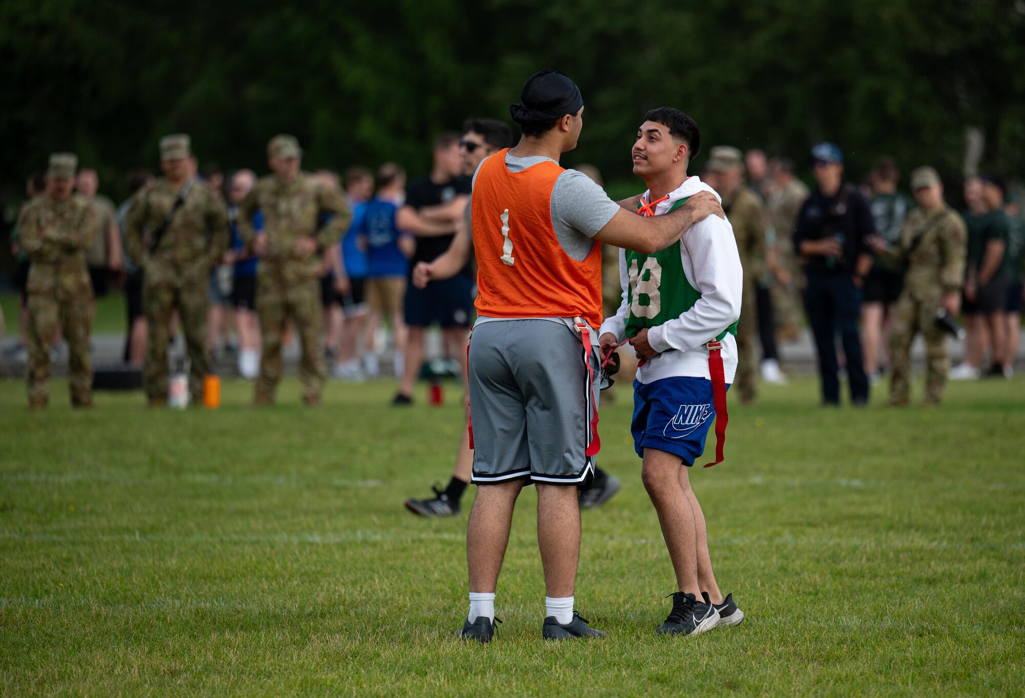 Airmen from the 354th Fighter Wing participate in a flag football competition during Icemen Sports Day