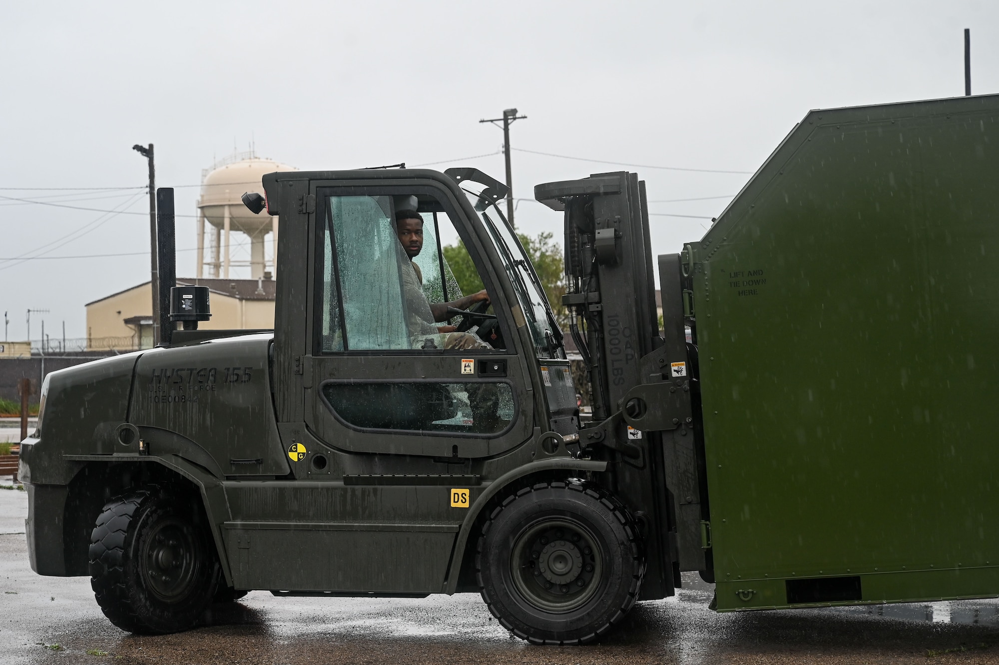 Senior Airman Caleb Sharper, 8th Logistics Readiness inbound cargo technician, drives a forklift during a cargo deployment function.