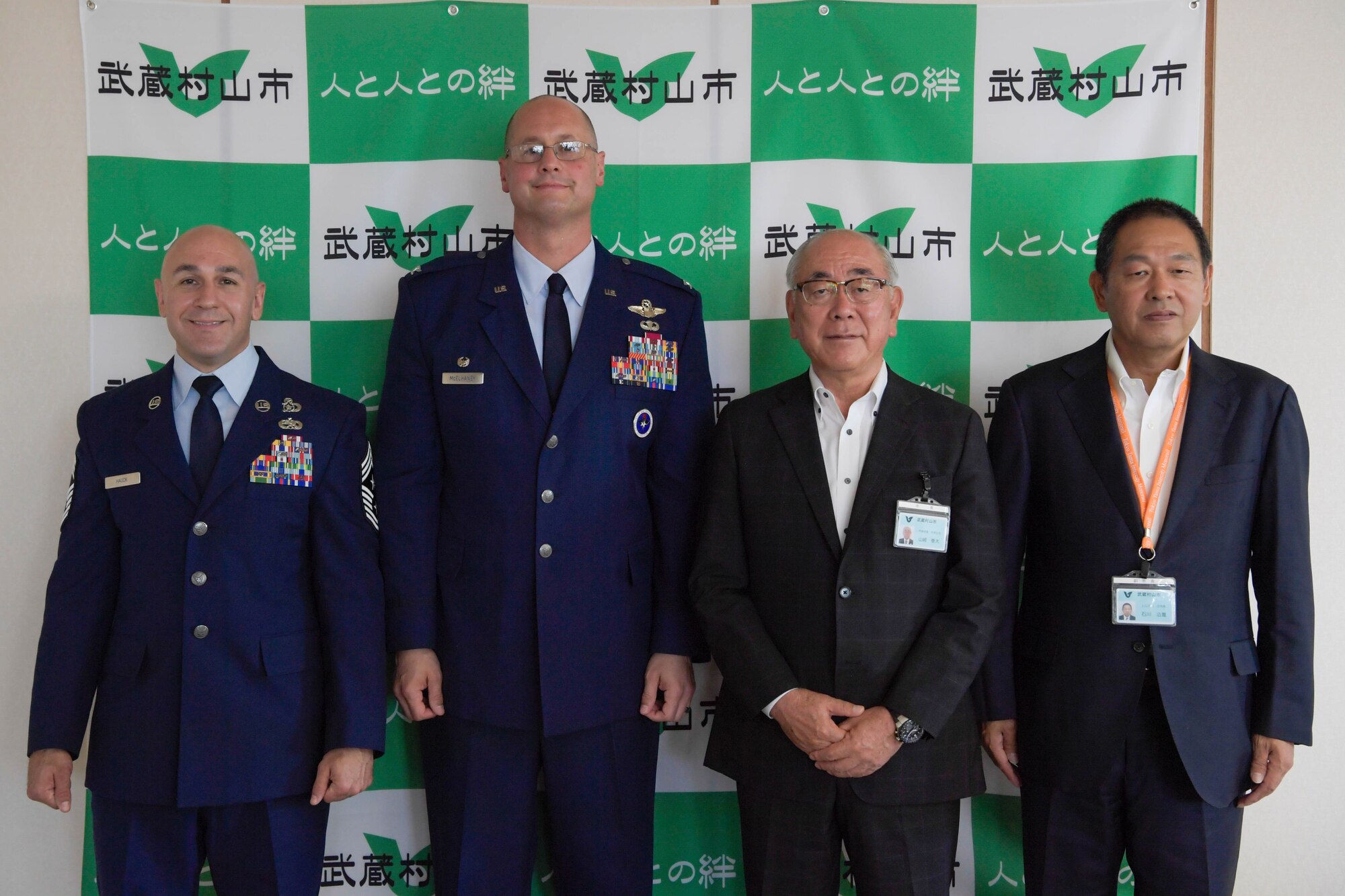 A group of people pose for a photo.