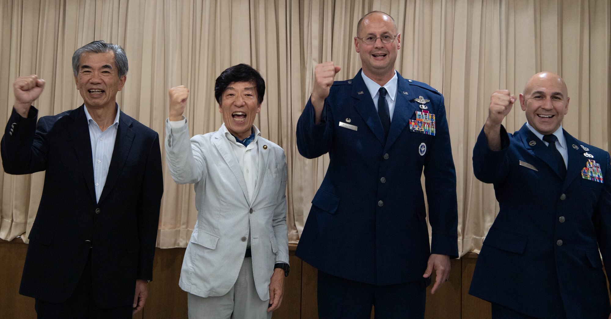 A group of people pose for a photo.