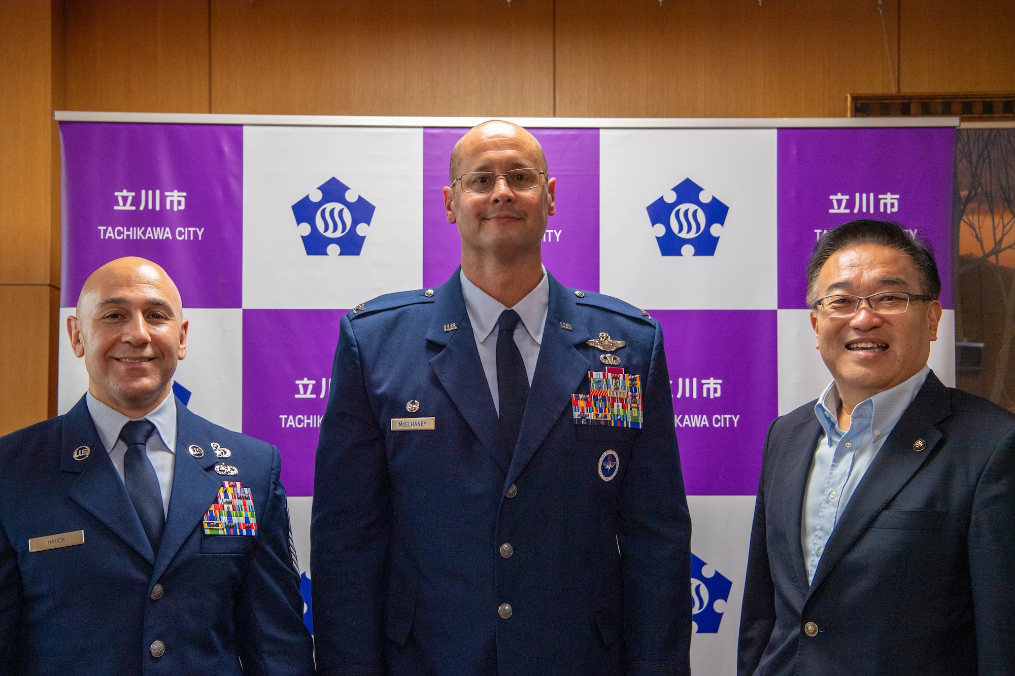 A group of people pose for a photo.