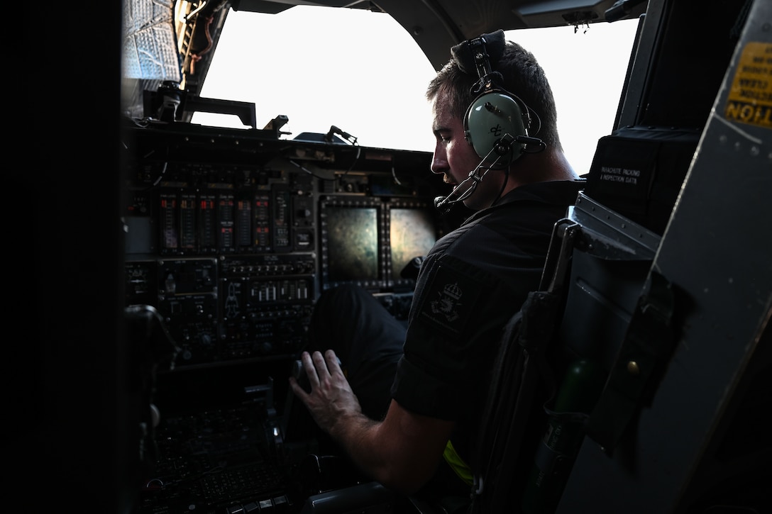 U.S. Air Force Staff Sgt. Jacob Szatkowski, 28th Maintenance Group dedicated crew chief, runs the auxiliary power unit of a B-1B Lancer to perform a refuel during Red Flag 24-3 at Nellis Air Force Base, Nev., July 25, 2024. Red Flag is an opportunity to enhance the readiness and training necessary to respond as a joint force to any potential crisis or challenge across the globe. (U.S. Air Force Photo by Senior Airman Yendi Borjas)