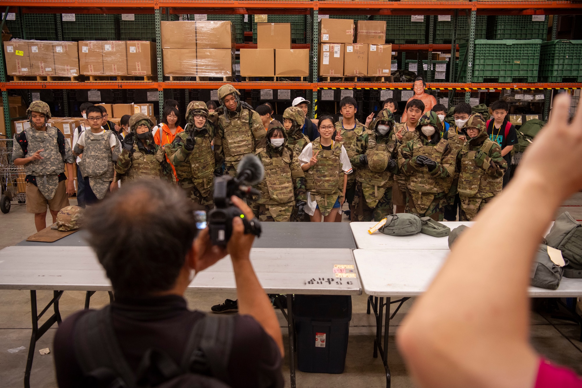 Misawa City Middle School students pose for a photo during a Junior English tour at Misawa Air Base, Japan, July 25, 2024.