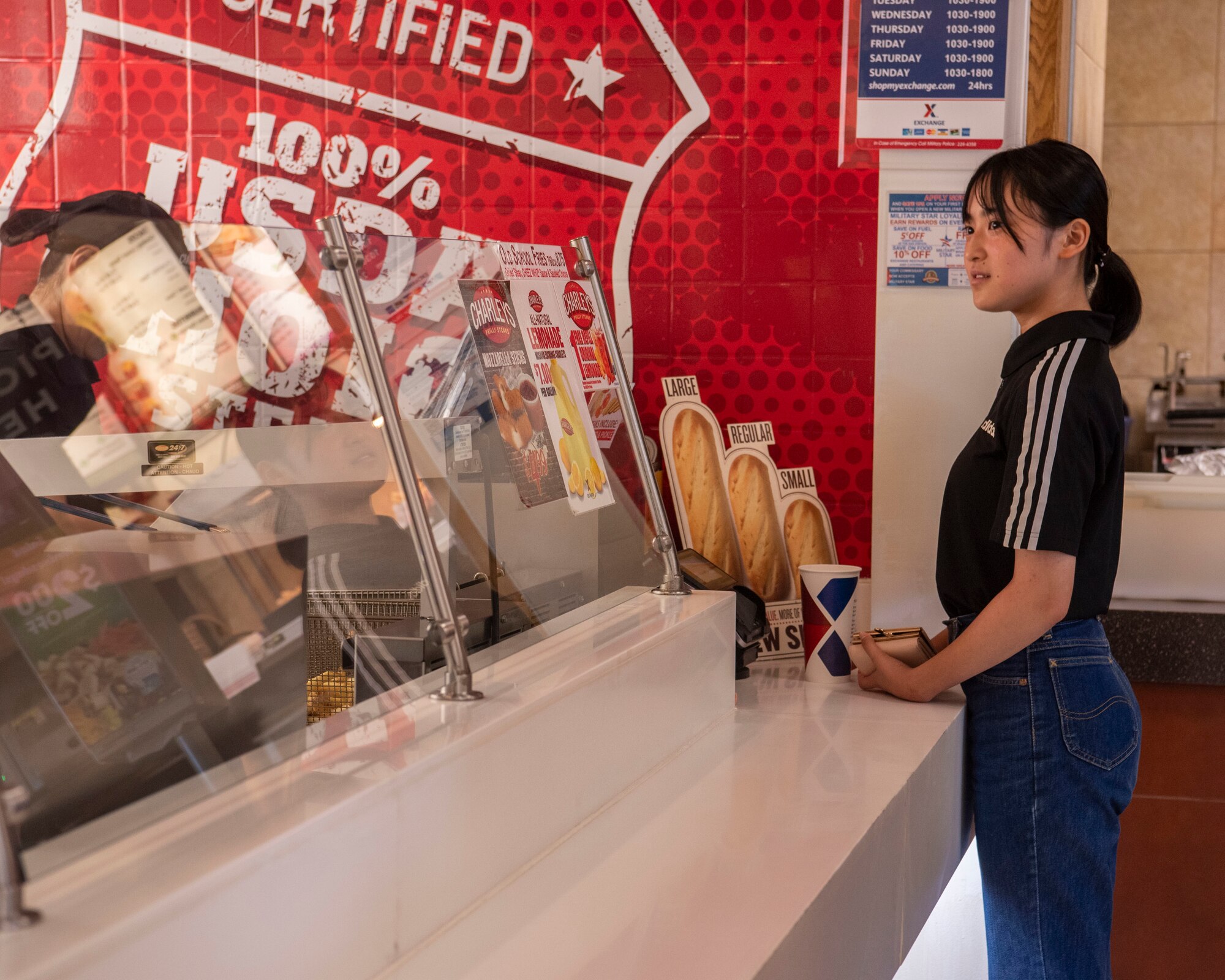 An Oirase Middle School student practices ordering her lunch order in English during a Junior English tour at Misawa Air Base, Japan, July 30, 2024.