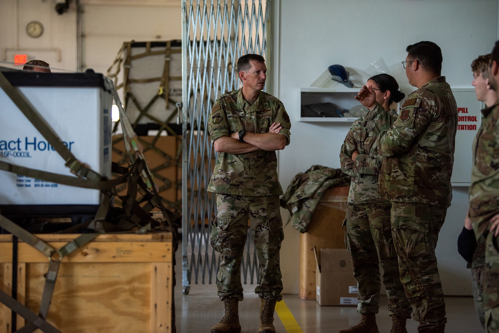 U.S. Air Force Col. Charles C. Merkel, 128th Air Refueling Wing commander, discusses pallet training with 128th ARW leadership at Volk Field Air National Guard base, Camp Douglas, Wisconsin, July 17, 2024.